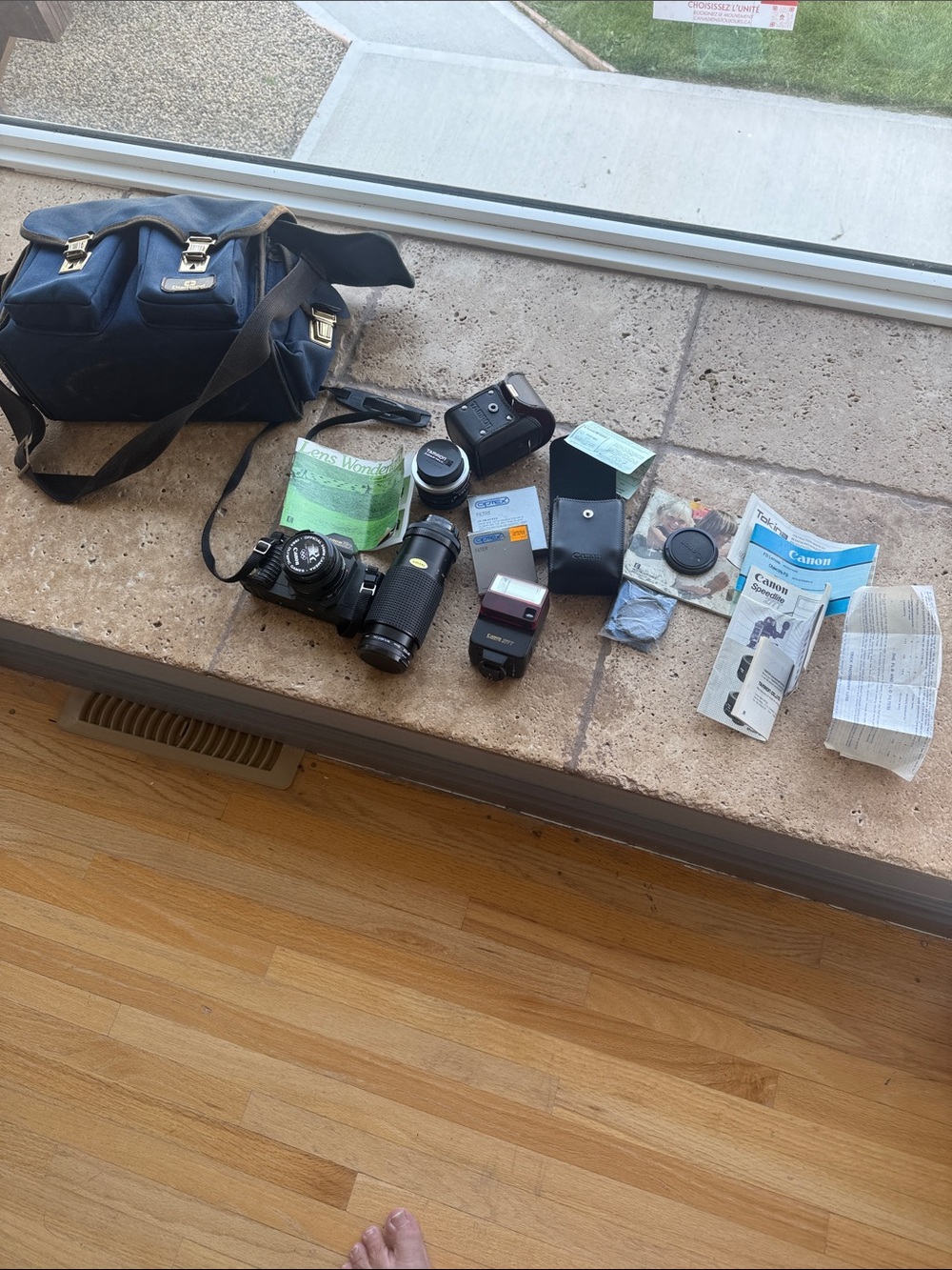 Canon Black Camera with accessories Telephoto Lens and Blue Carry Bag